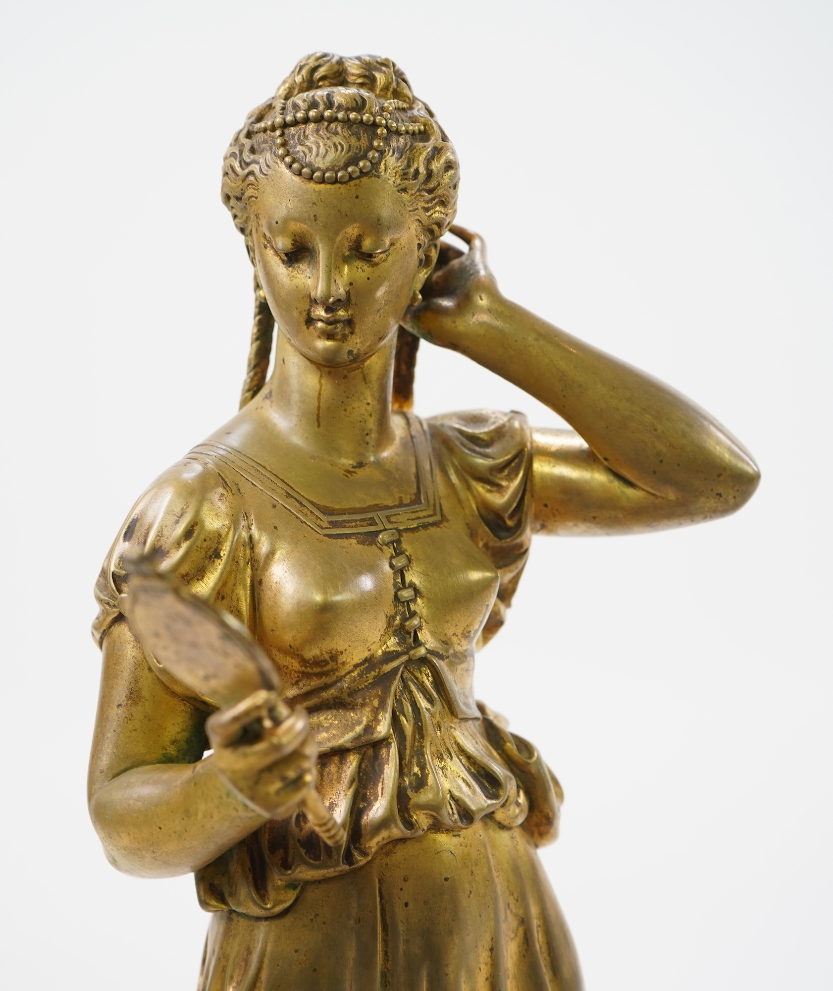 A French gilt bronze figural clock garniture, late 19th century